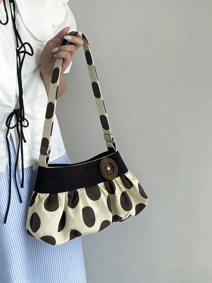 Polka dot cloud shoulder bag